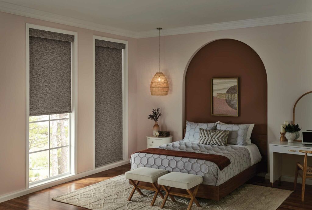 Graber Roman shades installed in the bedroom